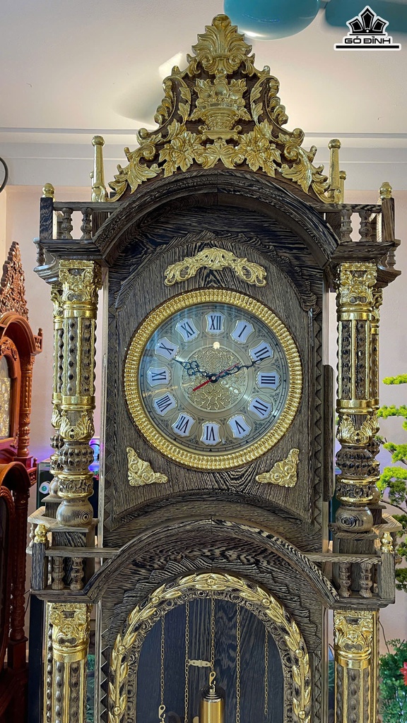 dong-ho-thap-go-mun-duoi-cong-cao-230-ngang-96-sau-40-cm-469750