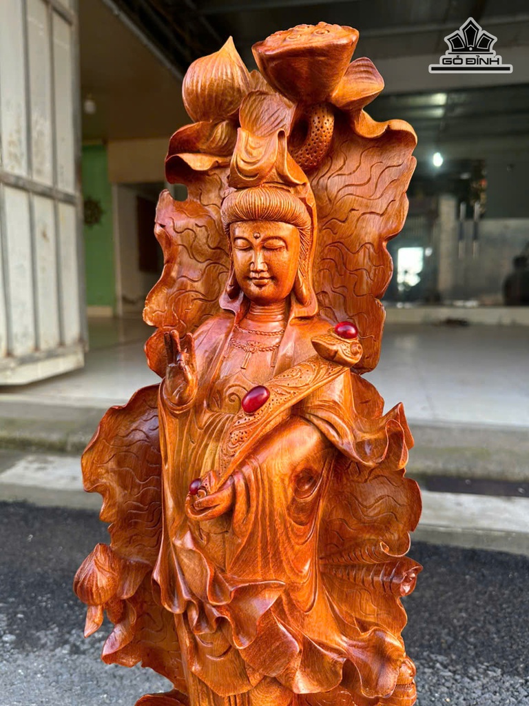 tuong-phat-ba-quan-am-go-huong-cao-70-ngang-23-sau-18-cm-471478