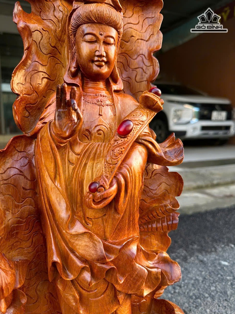 tuong-phat-ba-quan-am-go-huong-cao-70-ngang-23-sau-18-cm-471480