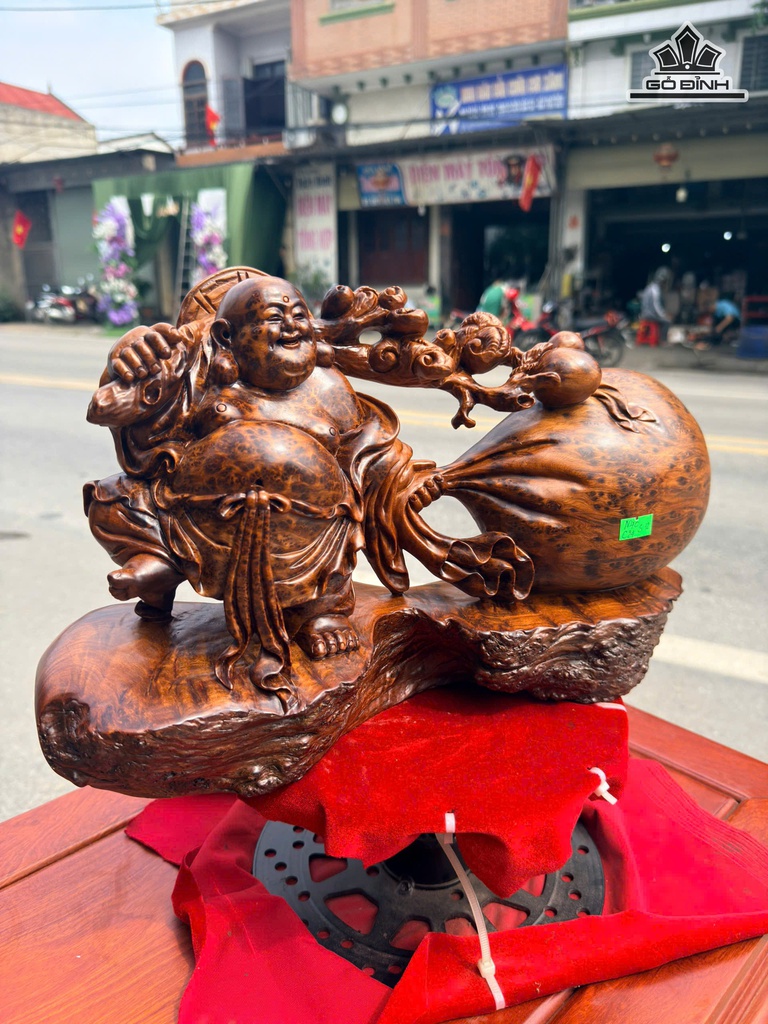 tuong-phat-di-lac-keo-bao-tien-go-nu-ngoc-am-cao-24-ngang-40-sau-12-cm-481718