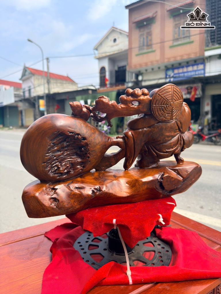 tuong-phat-di-lac-keo-bao-tien-go-nu-ngoc-am-cao-24-ngang-40-sau-12-cm-481719