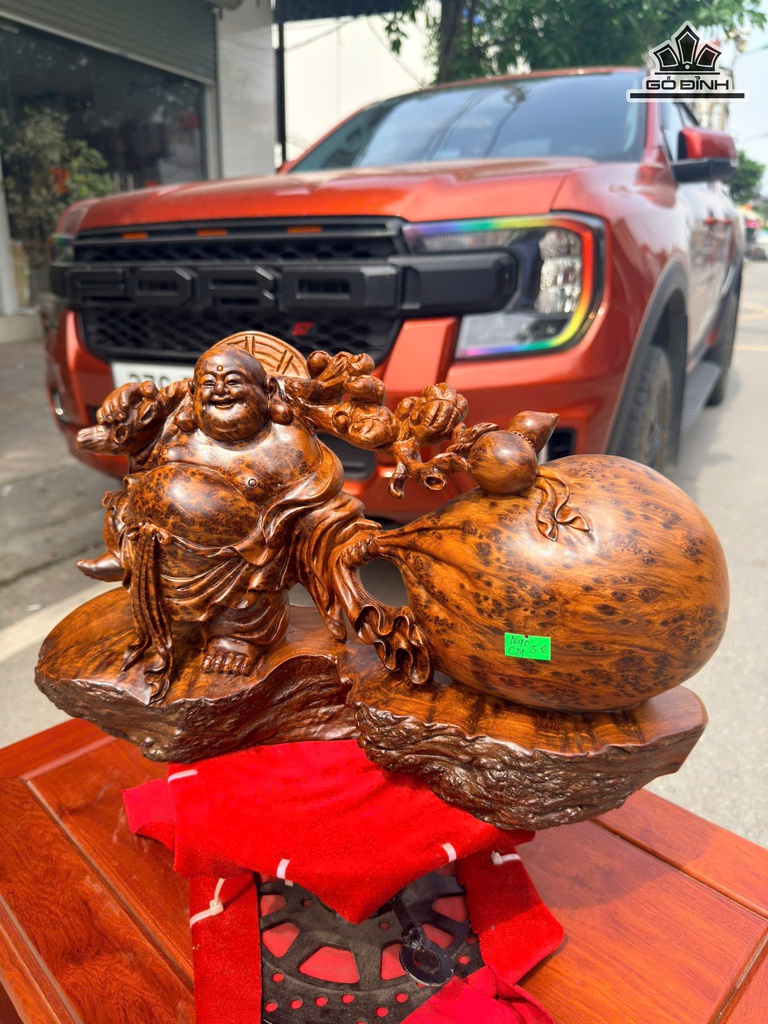 tuong-phat-di-lac-keo-bao-tien-go-nu-ngoc-am-cao-24-ngang-40-sau-12-cm-481720