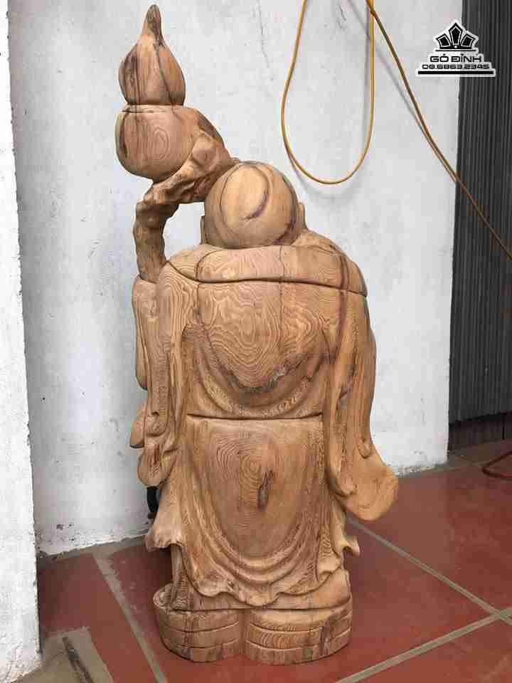 Tuong-phat-di-lac-vac-dao-go-ngoc-am-Ha-Giang-cao-66-rong-23-day-15-cm