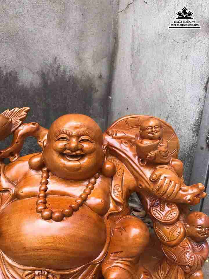 Phật di lặc kéo bao tiền gỗ xá xị  1