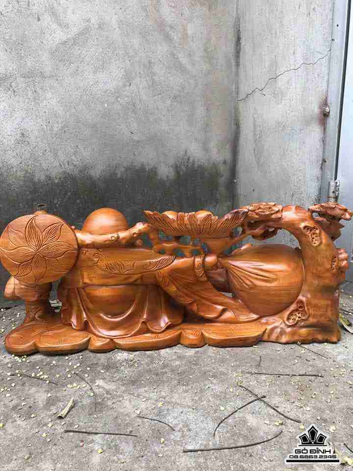 Phật di lặc kéo bao tiền gỗ xá xị  2