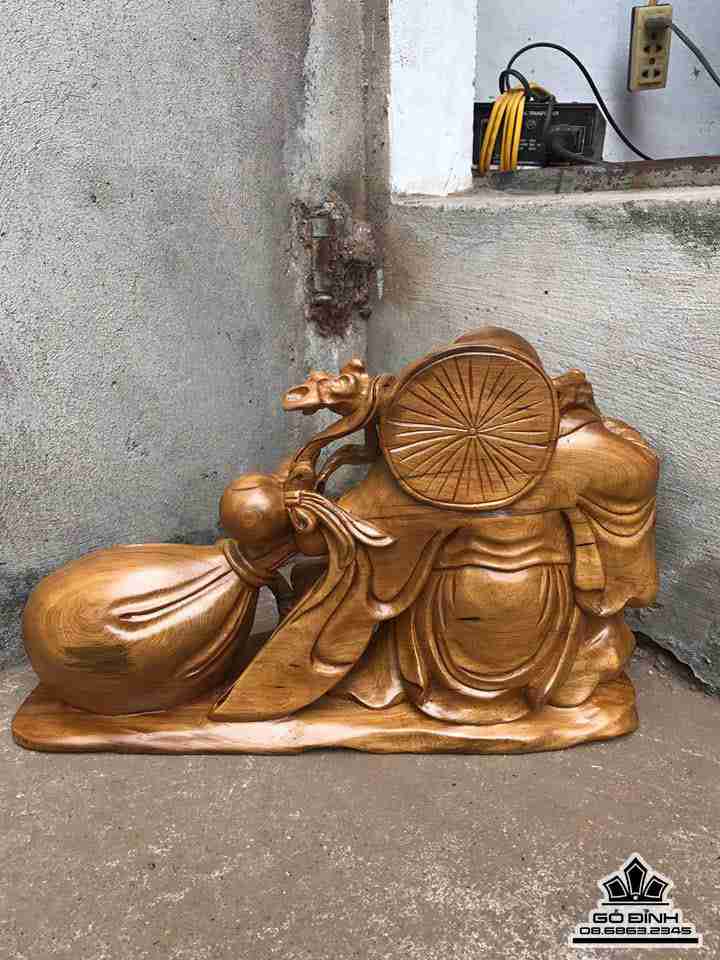 Phật di lặc kéo bao tiền gỗ bách xanh 3