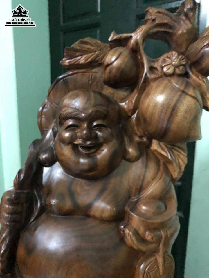 Phật di lặc vác cành đào gỗ xá xị 67x33x17 1