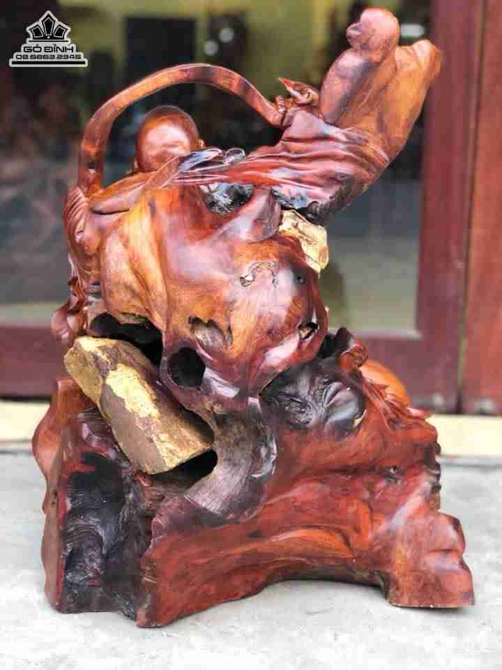 Phật di lặc gỗ hương ôm đá 65x50x35 4
