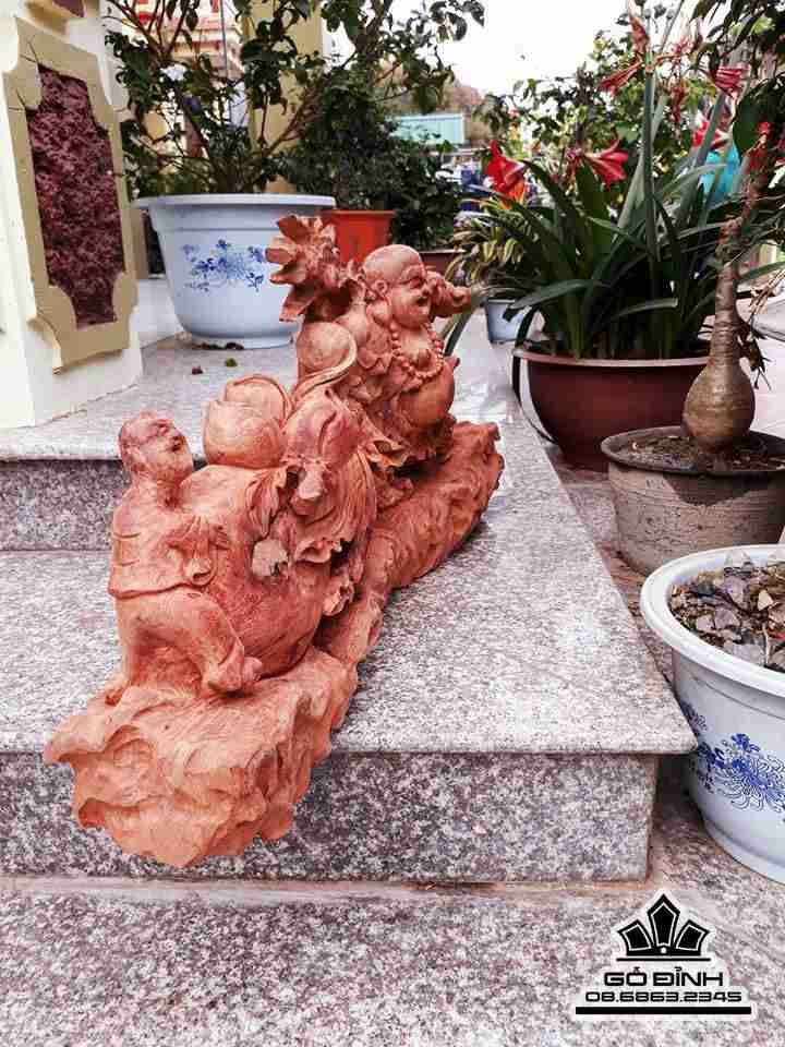 Phật di lặc kéo bao tiền gỗ hương 34x75x18 1