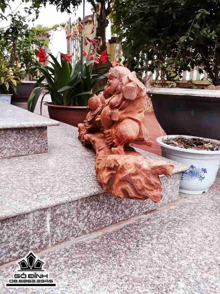 Phật di lặc kéo bao tiền gỗ hương 34x75x18 3