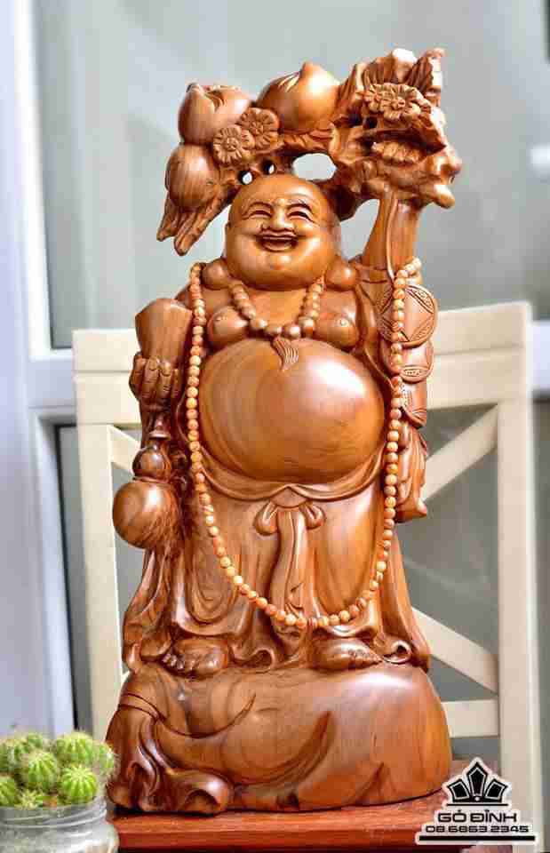 Phật di lặc vác cành đào gỗ bách xanh thơm 56x26x16 1