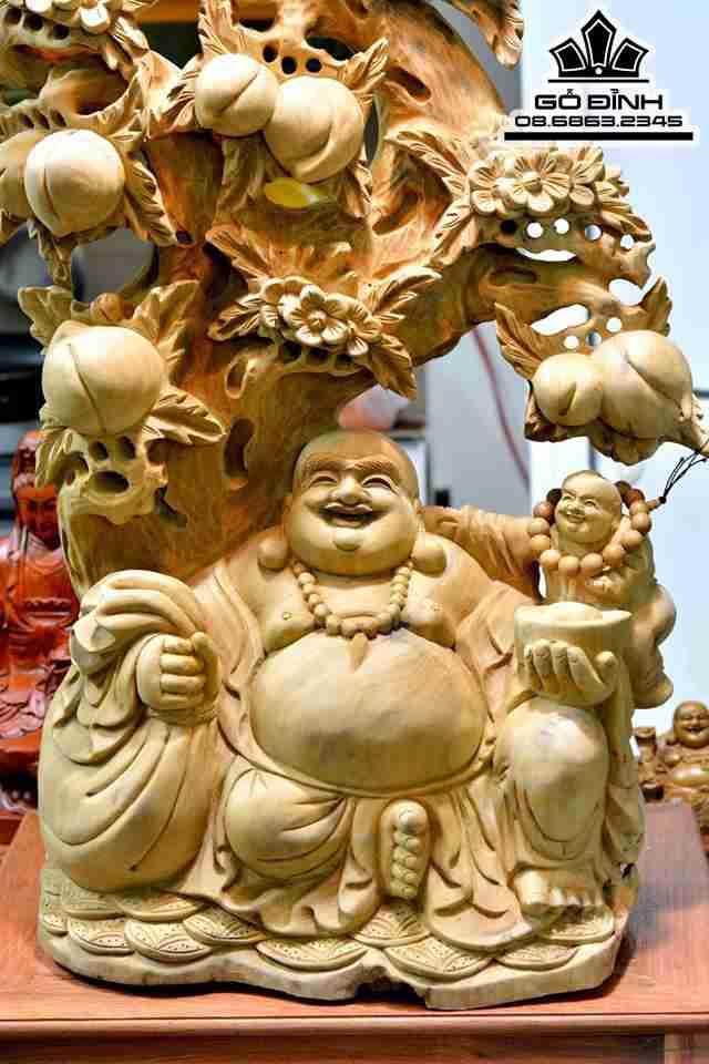 Phật di lặc ngồi gốc đào gỗ xá xị thơm 71x46x20 4