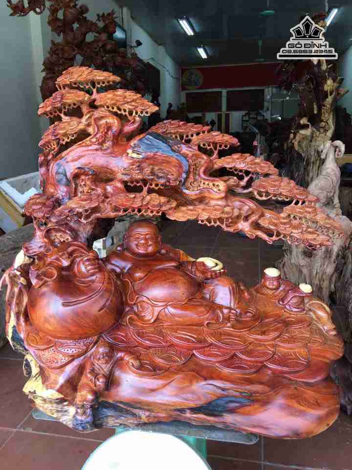 Tượng Phật Di Lặc ngồi gốc tùng gỗ hương  cao  68 rộng 81 sâu 40 (cm)