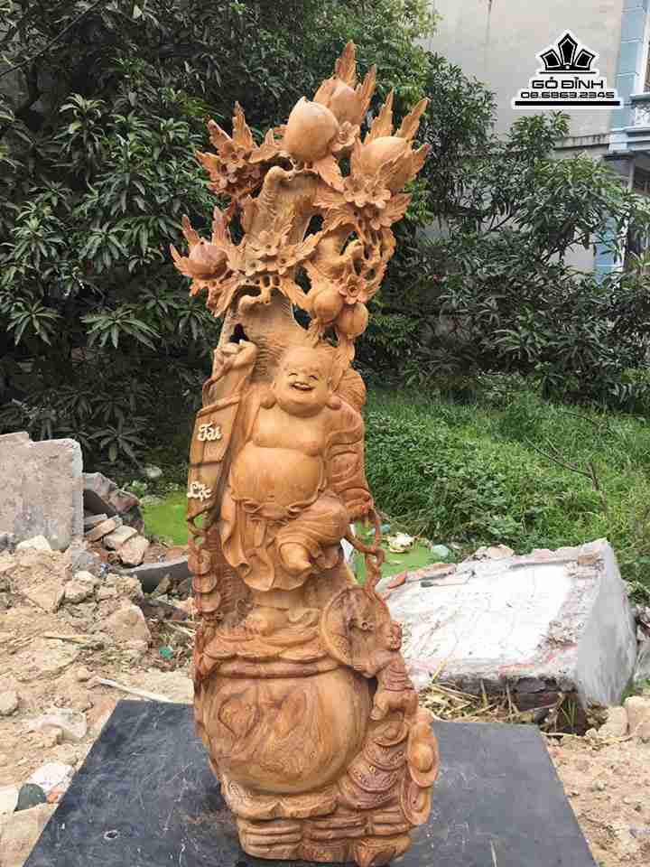 Tượng phật di lăc đứng gốc đào gỗ ngọc am  cao 98 rộng 42 sâu 24 (cm)