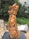Tượng phật di lăc đứng gốc đào gỗ ngọc am  cao 98 rộng 42 sâu 24 (cm)