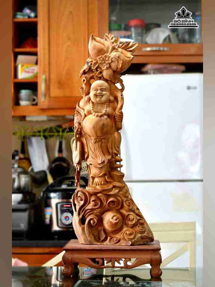 Phật di lặc vác cành đào gỗ ngọc am  cao 78 ngang 30 dày 18 (cm)