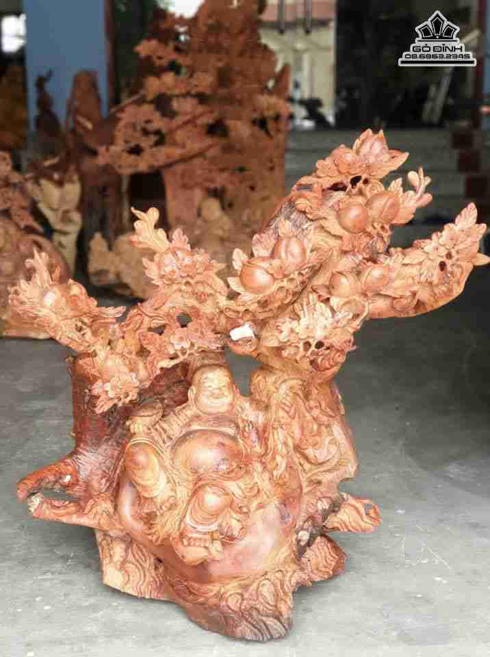 Phật di lặc ngồi gốc đào gỗ hương  cao 93 rộng 90 dày 50 (cm)