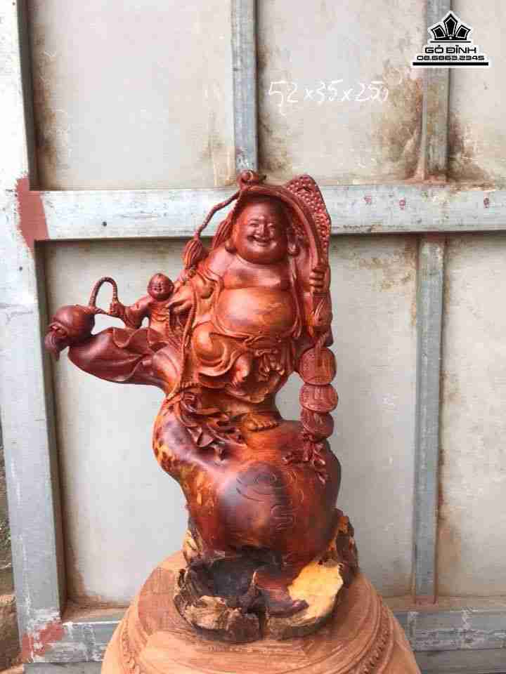 Phật di lặc như ý gỗ hương  cao 52 rộng 35 dày 25 (cm)