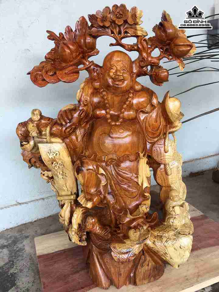 Phật di lặc vác cành đào gỗ hương  cao 85 rộng 55 dày 35 (cm)
