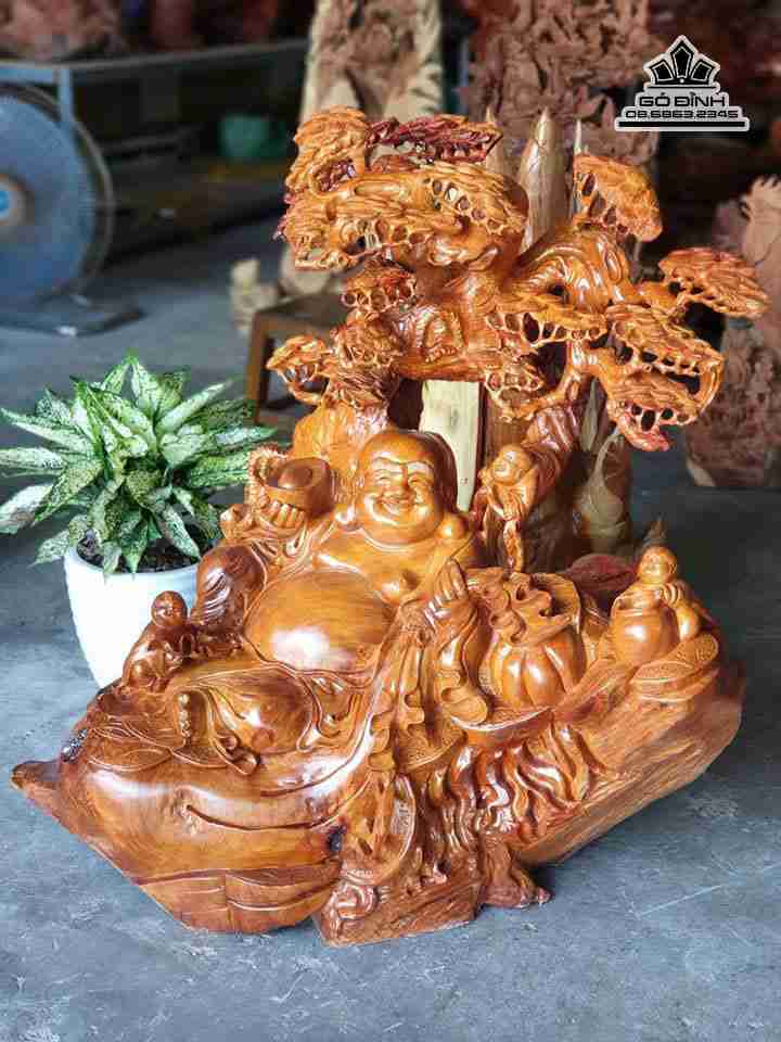 Phật di lặc ngồi gốc đào gỗ hương  cao 85 rộng 83 dày 53 (cm)