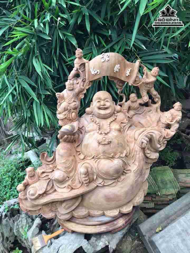 Phật di lặc ngồi bao tiền gỗ xá xị  cao 99 rộng 1m10 dày 45 (cm)