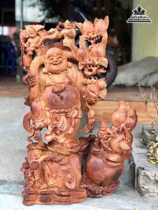 Phật di lặc vác cành đào gỗ hương  cao 78 rộng 51 dày 36 (cm)