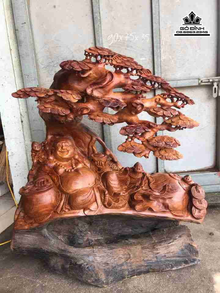 Phật di lặc ngồi gốc tùng gỗ hương  cao 90 rộng 75 dày 35 (cm)