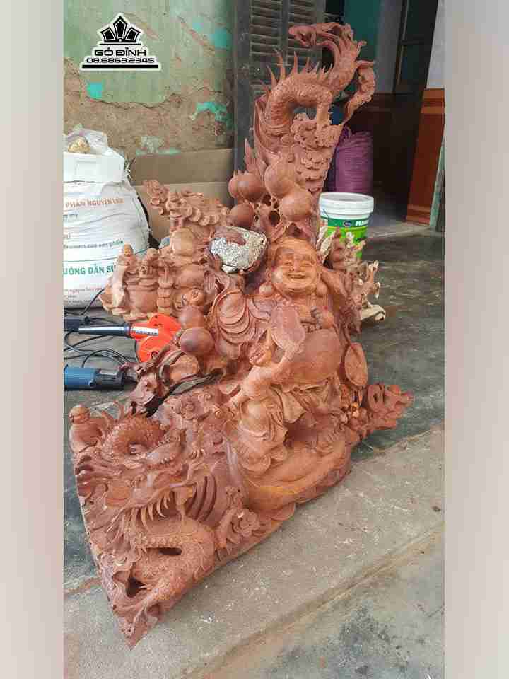 Phật di lặc cưỡi rồng gỗ hương  cao 95 rộng 90 dày 50 (cm)