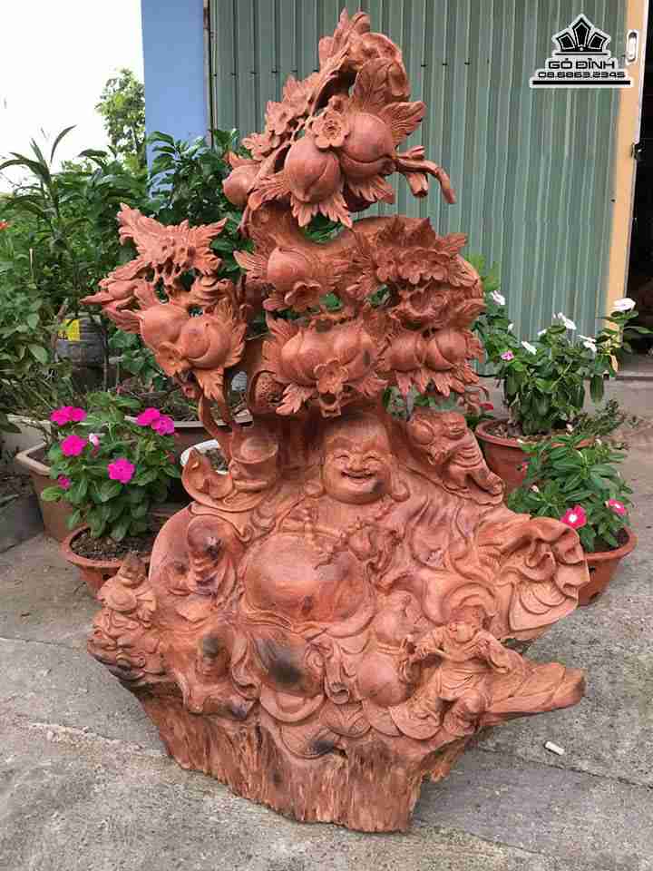 Phật di lặc ngồi gốc đào gỗ hương  cao 77 rộng 62 dày 48 (cm)