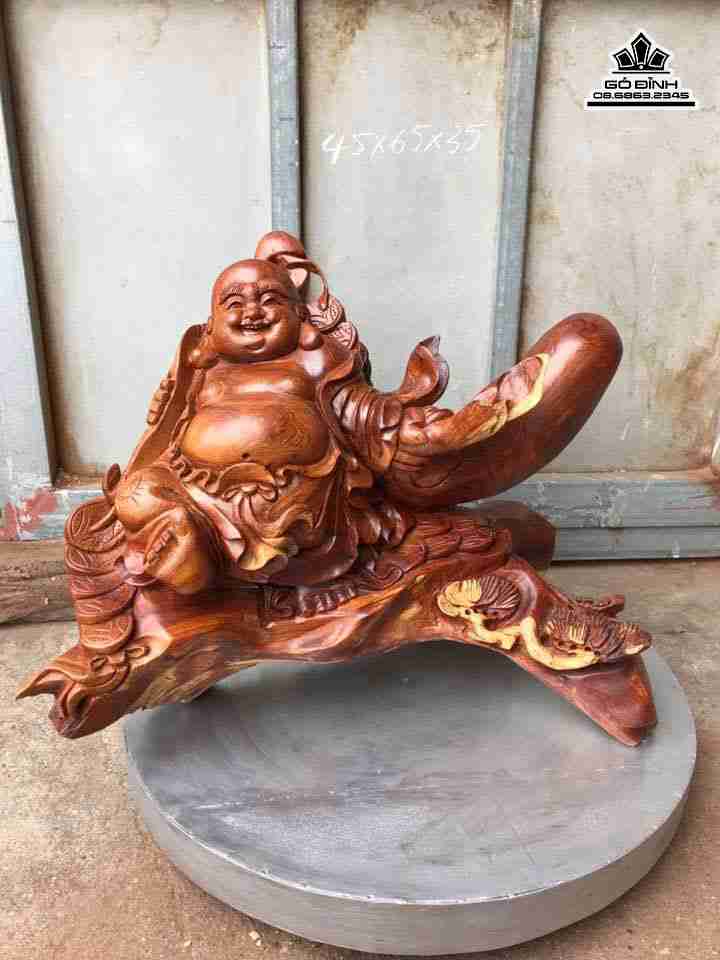 Phật di lặc ngồi bao tiền gỗ hương  cao 45 rộng 65 dày 35 (cm)