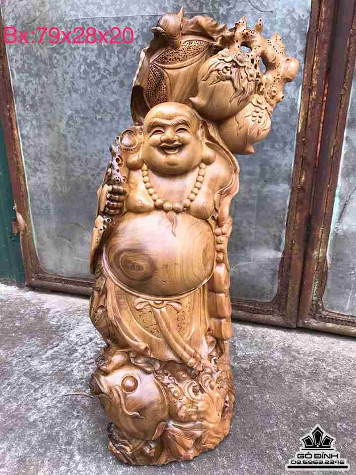 Phật di lặc cưỡi cá chép gỗ bách xanh  79 rộng 28 dày 20 (cm)