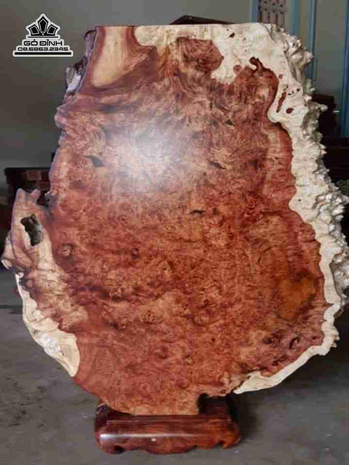 Mặt trưng phòng khách gỗ nu hương  dài 100 rộng 70 dày 9-14 (cm)