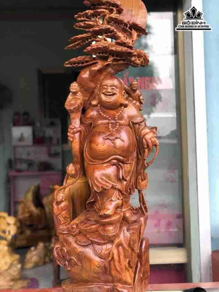 Phật di lặc đứng gốc tùng gỗ hương  cao 120 rộng 38 dày 33 (cm)