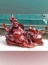 Phật di lặc kéo bao tiền gỗ hương  cao 50 dài 82 dày 28 (cm)