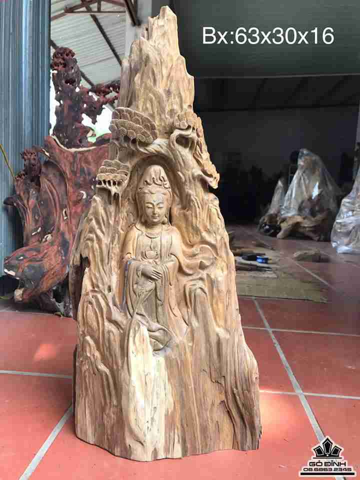 Phật bà ngồi tùng gỗ bách xanh  63x30x16