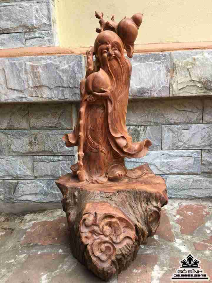 Ông tiên vác cành đào gỗ hương  68x33x35