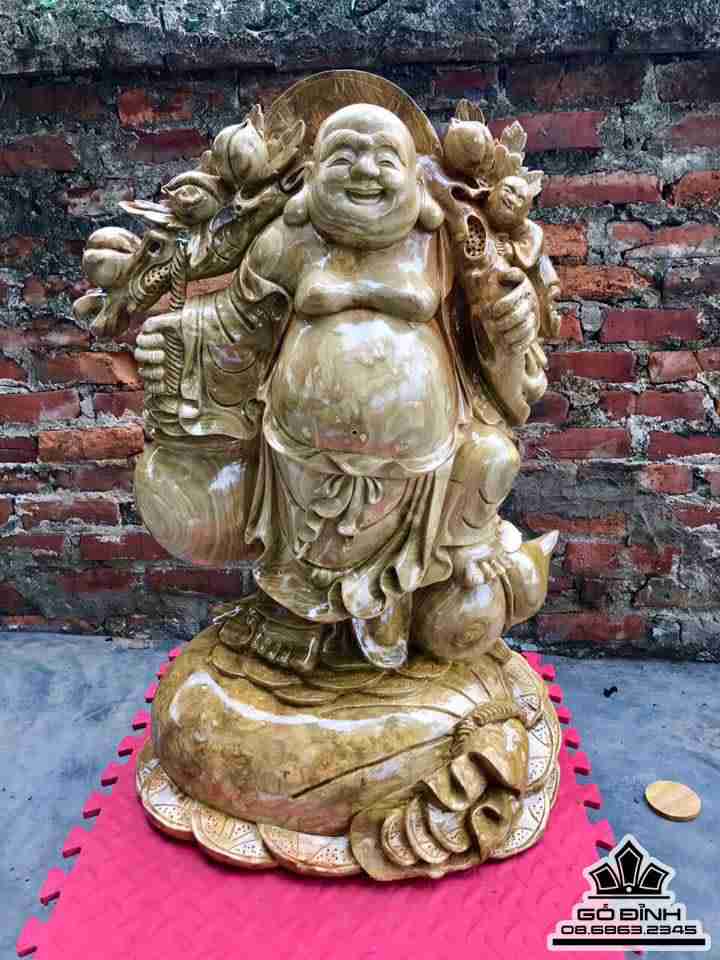 Phật di lặc vác cành đào gỗ nu nghiến  79x52.5x39,5