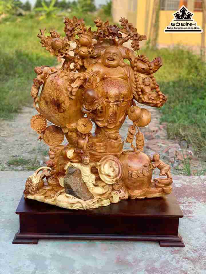 Tượng Phật Di Lặc Vác Cành Đào Tài Lộc Gỗ Nu Hương  Cao 100 ( Cả kỷ ) Ngang 75 Sâu 35 (cm)