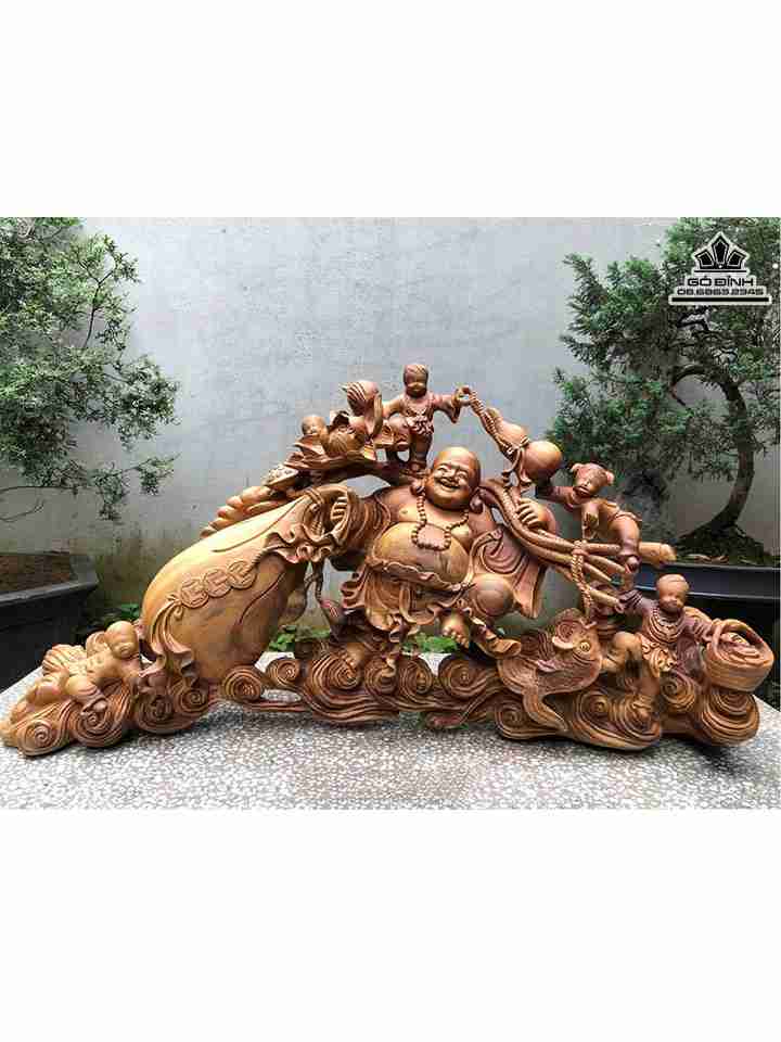 Tượng Phật Di Lặc Kéo Bao Tiền Gỗ Xá Xị (Gù Hương)  Cao 51 Ngang 100 Sâu 30 (cm)