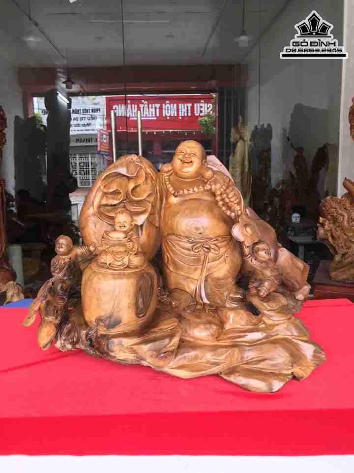 Tượng Phật Di Lặc Tam Phúc Gỗ Bách Xanh  Cao 55 Ngang 68 Sâu 55 (cm)