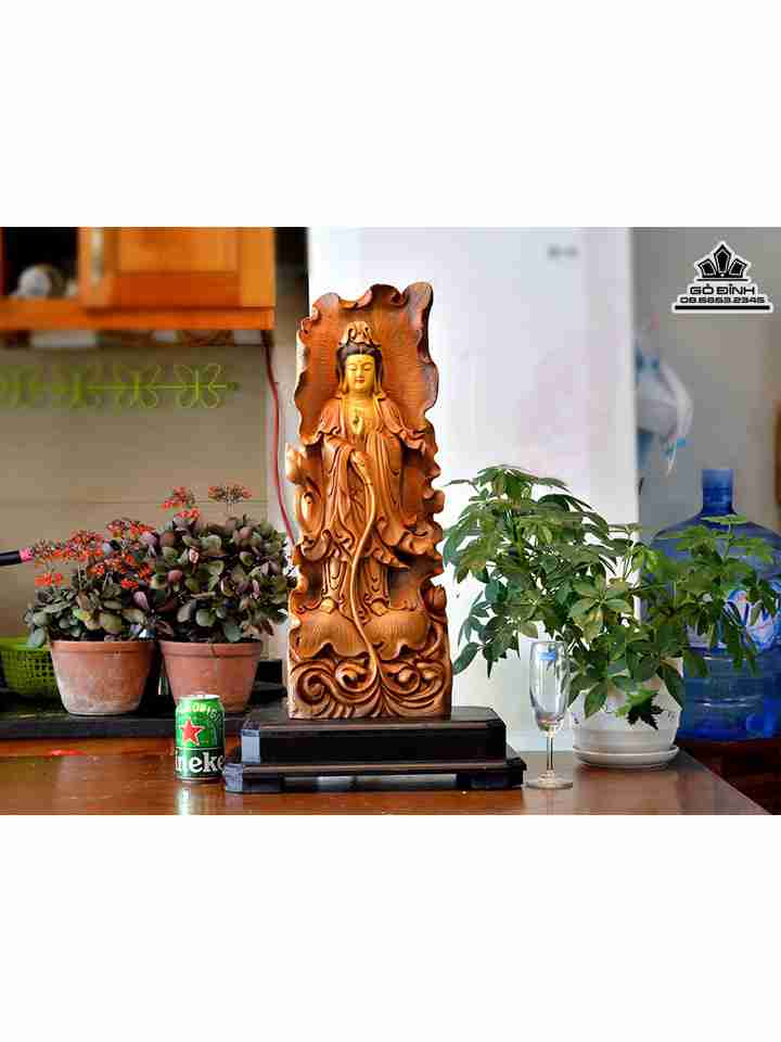 Tượng Phật Bà Quan Âm Gỗ Bách Xanh  Cao 68 Ngang 22 Dày 12 (cm) tính cả kỷ kê