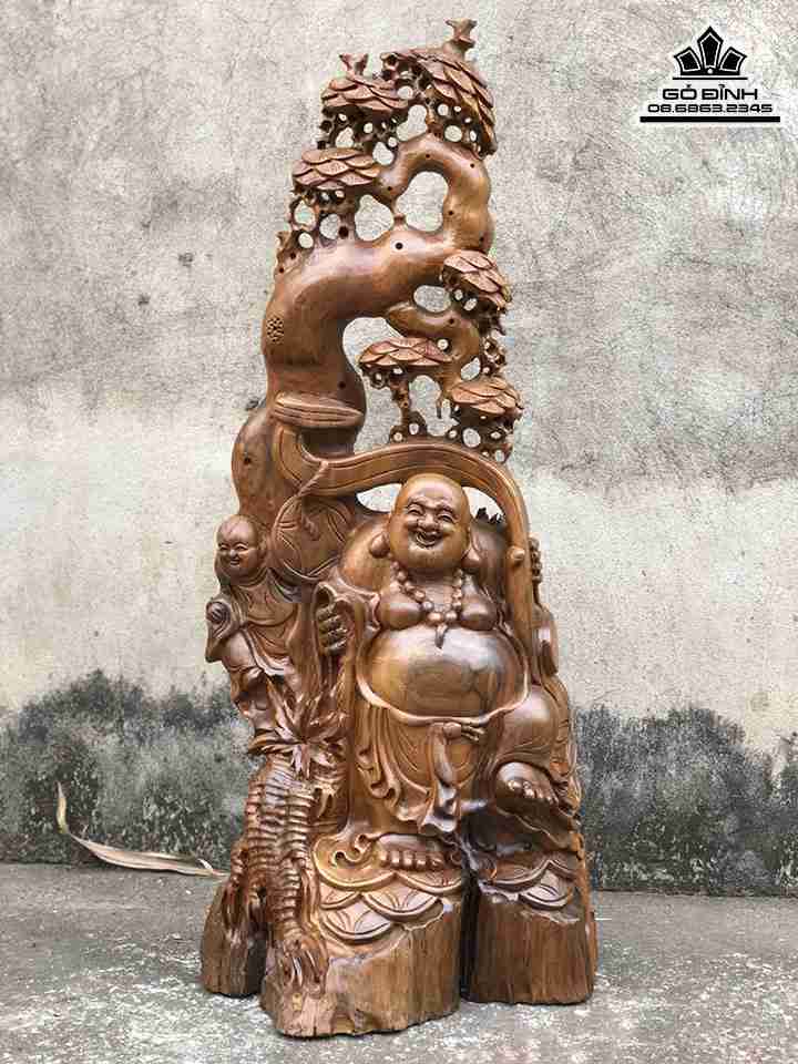 Tượng Phật Di Lặc Đứng Gốc Tùng Gỗ Bách Xanh  Cao 71 Ngang 29 Sâu 21 (cm)