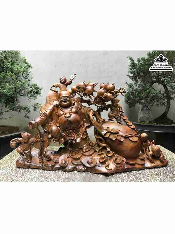 Tượng Phật Di Lặc Kéo Bao Tiền Gỗ Xá Xị ( Gù Hương )  Cao 55 Ngang 90 Sâu 20 (cm)