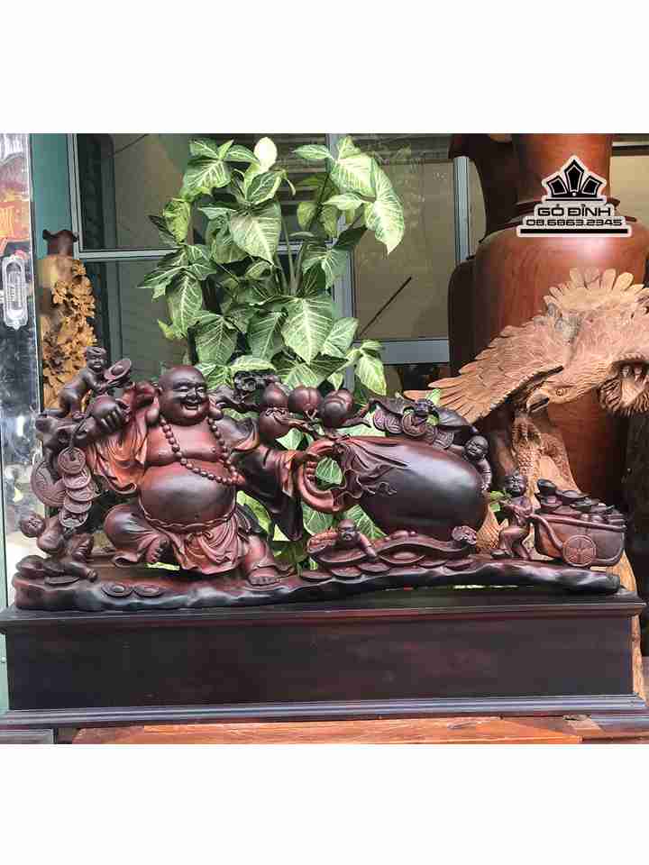 Tượng Phật Di Lặc Kéo Bao Tiền Gỗ Trắc  Cao 39 Rộng 90 Sâu 20 (cm)