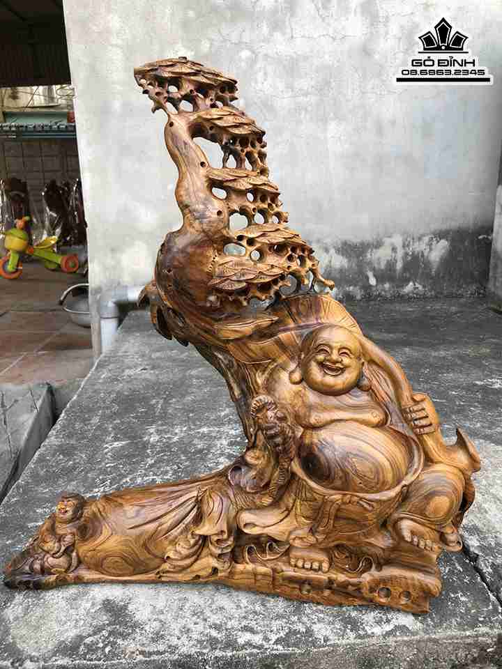 Tượng Phật Di Lặc Vác Gậy Như Ý Gỗ Bách Xanh  Cao 54 Rộng 48 Dày 13 (cm)