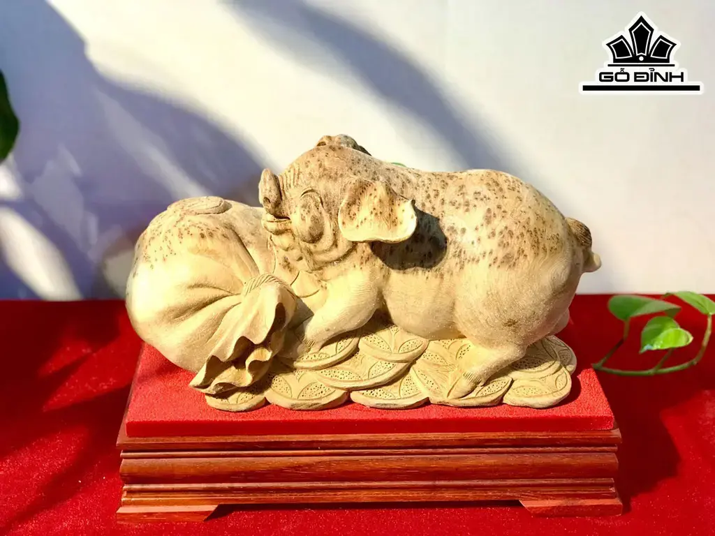 Tượng Heo Gỗ Nu Ngọc Am Cao 20 Ngang 35 Sâu 20 (cm)
