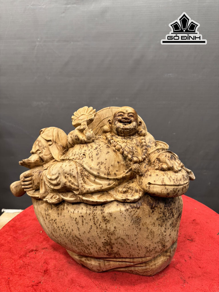 Tượng Phật Di Lặc Ngự Chum Tiền Gỗ Nu Ngọc Am Cao 30 Ngang 32 Sâu 22 (cm)