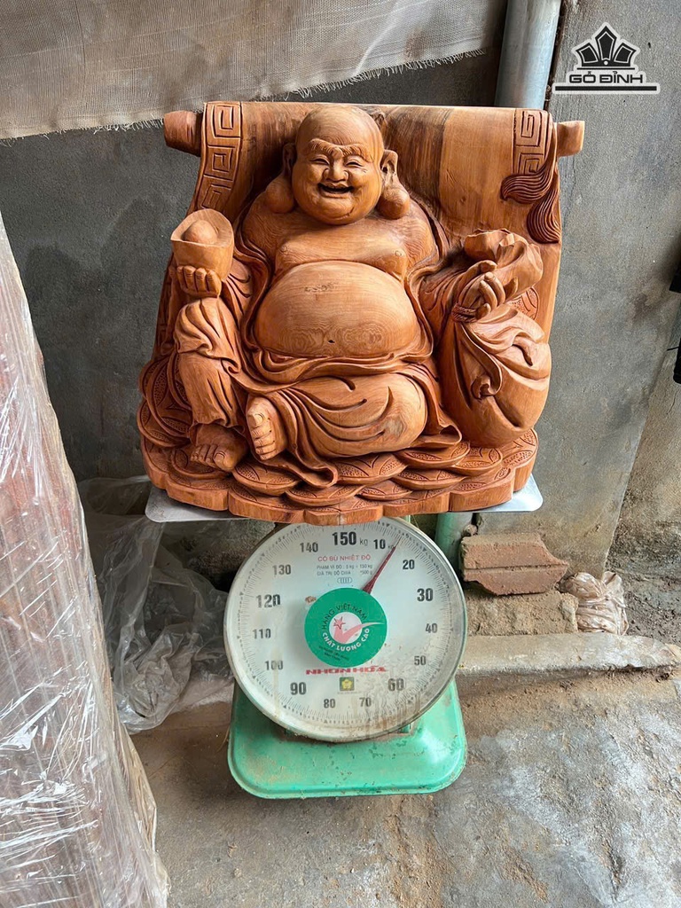 Tượng Phật Di Lặc Tựa Cuốn Thư Gỗ Ngọc Am Cao 35 Ngang 50 Sâu 27 (cm)