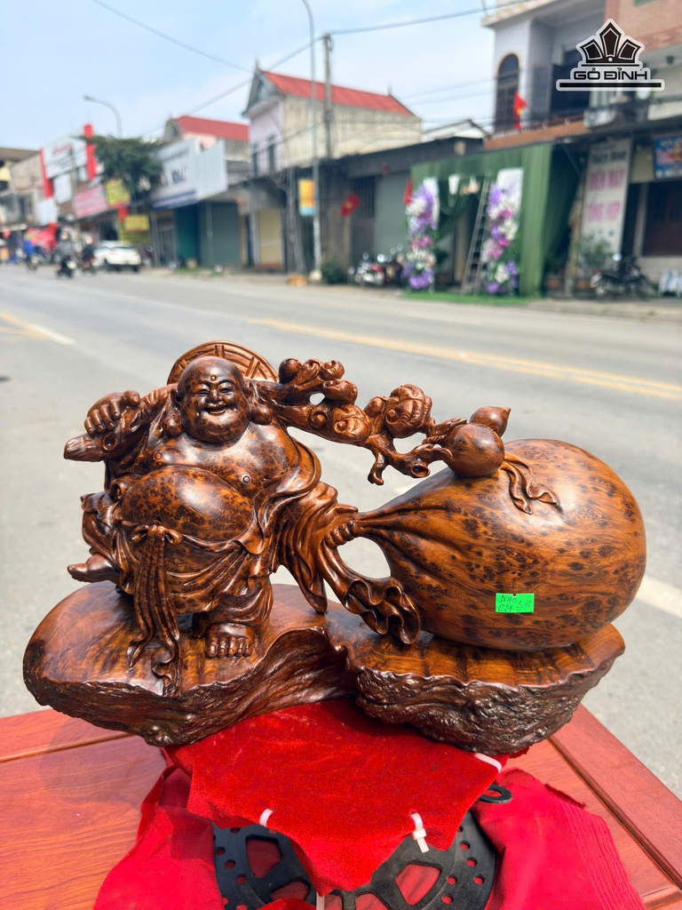 Tượng Phật Di Lặc Kéo Bao Tiền Gỗ Nu Ngọc Am Cao 24 Ngang 40 Sâu 12 (cm)