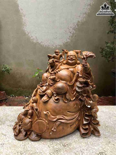 Tượng Phật Di Lặc Ngồi Bao Tiền Gỗ Xá Xị (Gù Hương)  Cao 50 Ngang 52 Sâu 35 (cm)